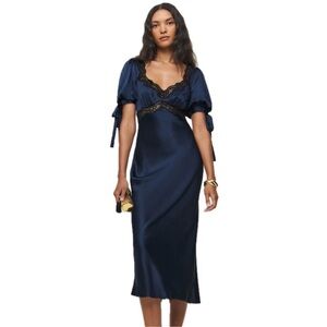 Reformation Stella Silk Dress
Reformation x Kacey Musgraves
$348
Navy